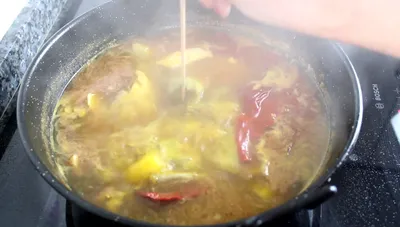 Receta de Arroz Caldoso con Pollo, Conejo y Alcachofas