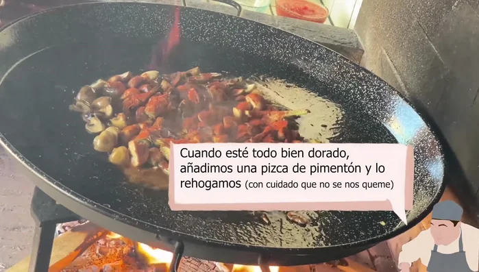 Una vez todo esté dorado, agregar una pizca de pimentón y rehogar. Con cuidado, añadir el tomate y dejar evaporar el agua.