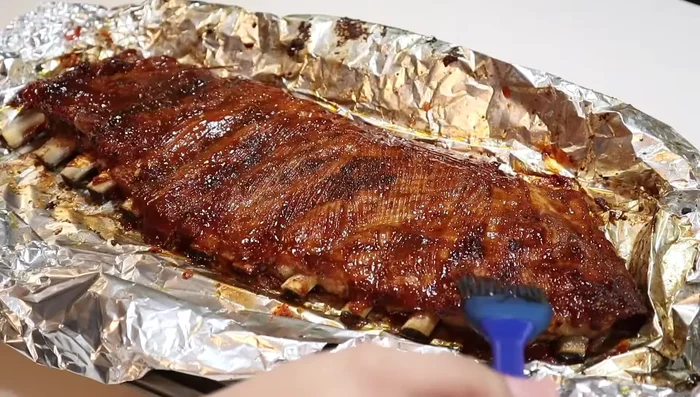 Retirar del horno y dejar reposar 10 minutos para que absorba la salsa.